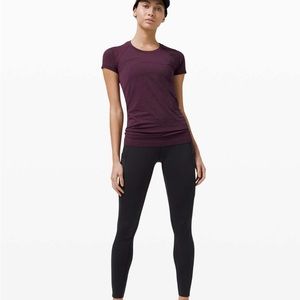 Size 8 women’s lululemon swiftly tech short sleeve shirt, deep fuchsia/black.